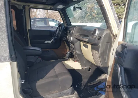 2011 Jeep Wrangler Sport z USA, uszkodzony, nr VIN 1J4AA2D14BL623083